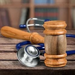 Gavel and stethoscope law and health concept 