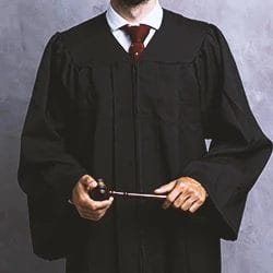A silk lawyer holding a gavel