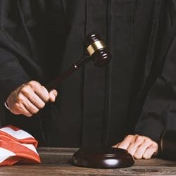 A prosecutor lawyer holding a gavel